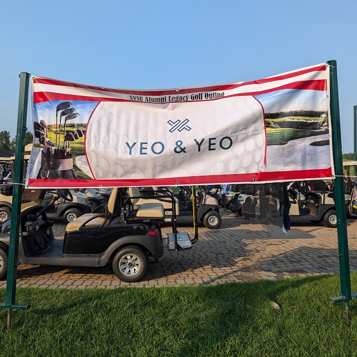 Yeo & Yeo sign for sponsoring the Alumni Legacy Golf Outing